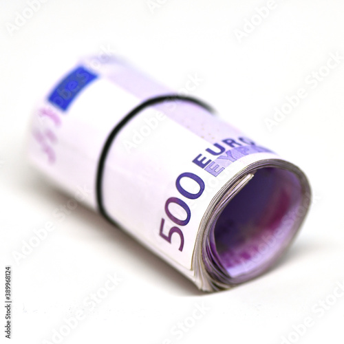 Roll of 500 euro money banknotes in rubber band