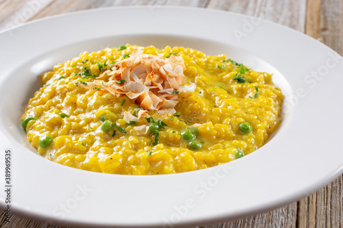 A view of a plate of saffron risotto.