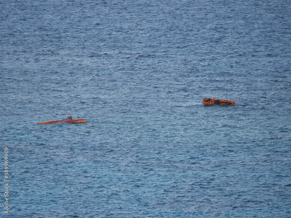 Fototapeta premium Okinawa,Japan-October 28, 2020: A broken stranded ship along Iguana Rock in Irabujima island, Okinawa 