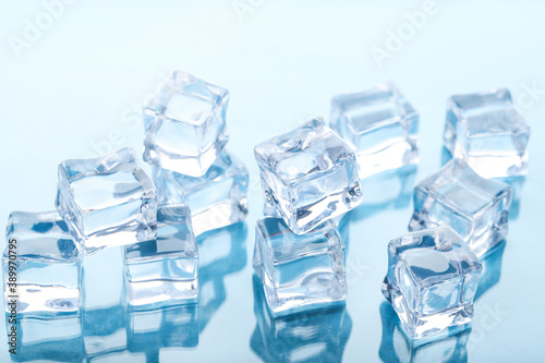 Ice cubes on blue background