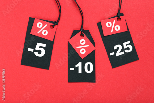 Sale tags with percents on red background