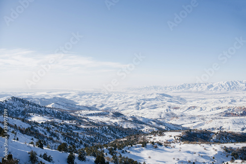 the tract of Beldersay  covered with snow in Uzbekistan on a clear day. Beldersay ski resort