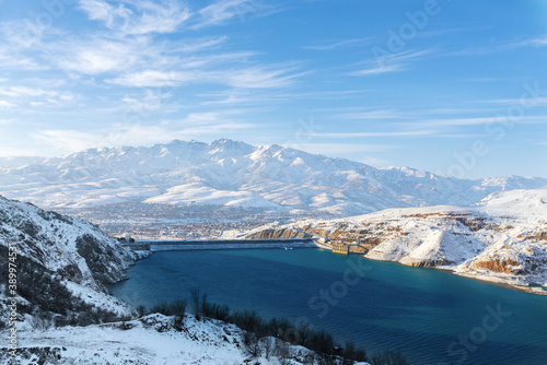 amazing winter landscape of Charvak reservoir in winter Uzbekistan
