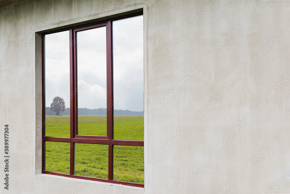 Fototapeta premium Large window in a new private house under construction