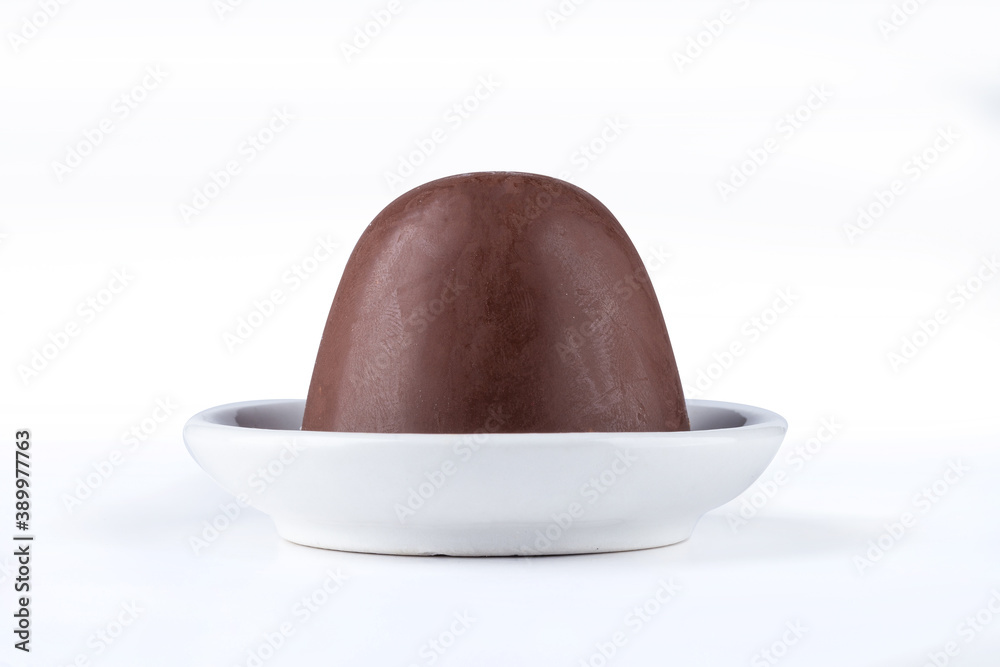 Chocolate truffle with delicious filling isolated on white background. Closeup photography. Chocolate truffle with delicious filling isolated on white background. Closeup photography.