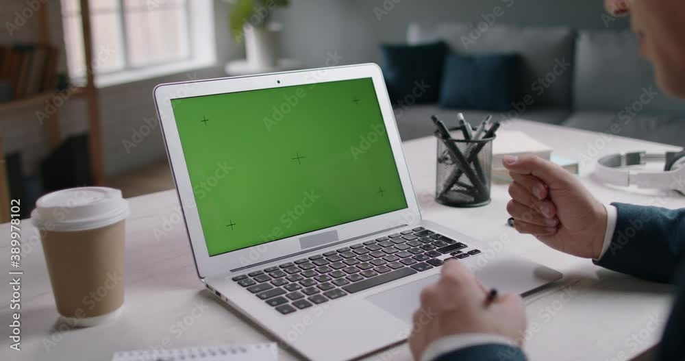Green screen template for video chat. Businessman using laptop having teleconference with employees, talking and gesturing 4k footage Green screen template for video chat. Businessman using laptop having teleconference with employees, talking and gesturing 4k footage