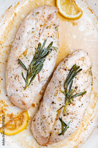 Chicken breast fillet baked with lemon and rosemary