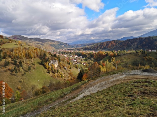 Amazing mountains landscape during fall season. Small village in the mountains. Rural landscape.
