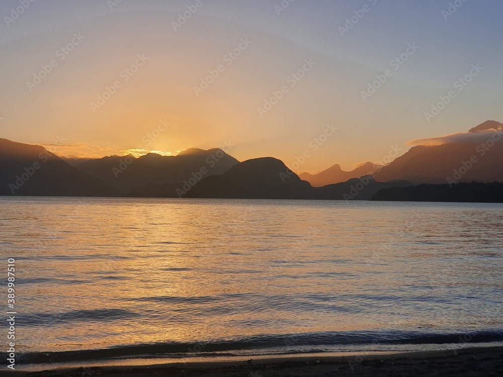 sunset over the lake
Lake Manapouri New Zealand 
Kepler