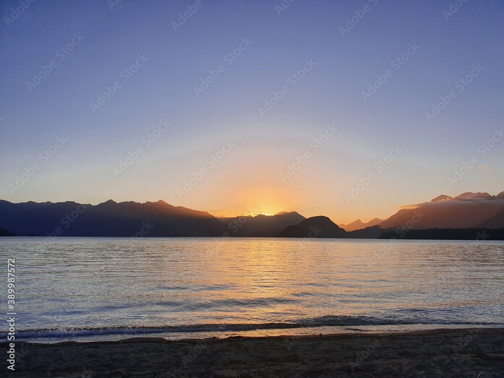 sunset over the lake
Lake Manapouri New Zealand 
Kepler
