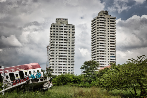 This unique photo shows wreckage of a passenger airplane lying in the middle of a meadow in an airplane cemetery in Bangkok.- Thailand