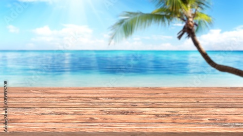 Empty wooden planks with blur beach on background, can be used for product placement. 3D render