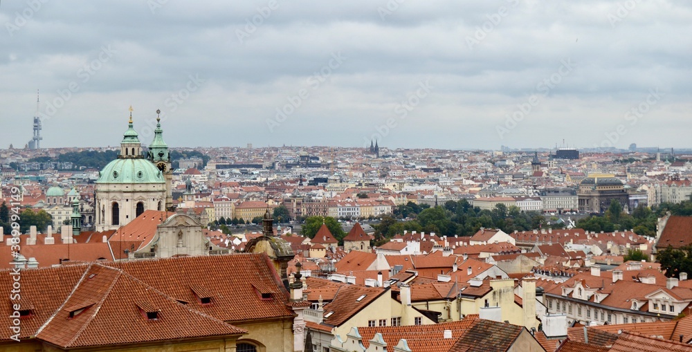 Prague skyline with its orange tiled roofs and many spires