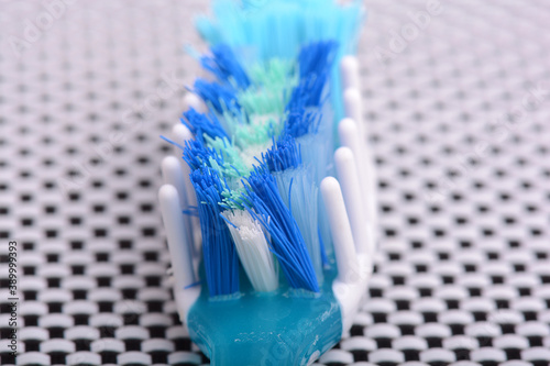Used old toothbrush toothbrush on a black and white background.