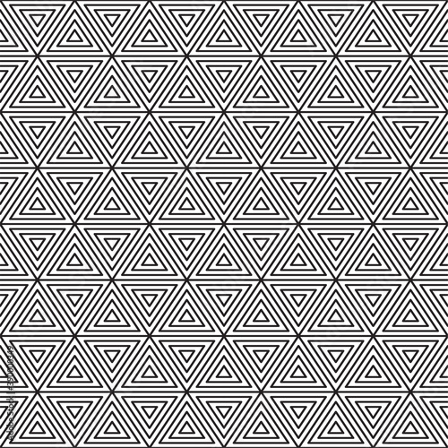 a geometric seamless pattern consisting of an arrangement of triangles, for printing fabrics, wallpaper, etc.