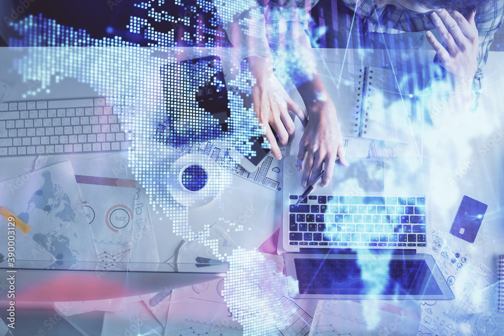 Double exposure of man and woman working together and financial graph hologram drawing. market analysis concept. Computer background. Top View. Double exposure of man and woman working together and financial graph hologram drawing. market analysis concept. Computer background. Top View.