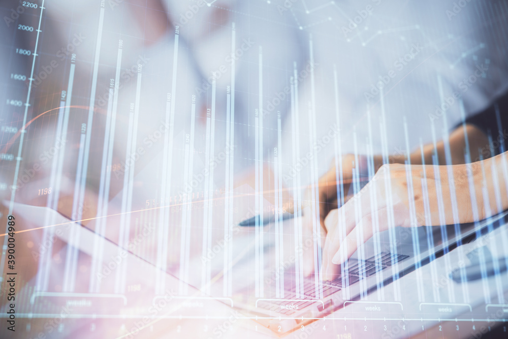 Double exposure of woman hands typing on computer and forex chart hologram drawing. Stock market invest concept. Double exposure of woman hands typing on computer and forex chart hologram drawing. Stock market invest concept.