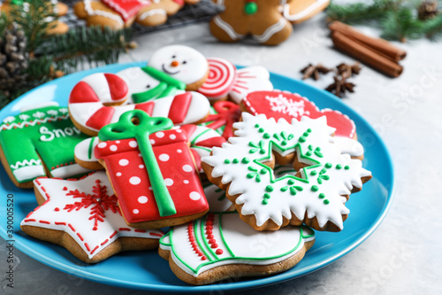 Delicious Christmas cookies on light marble table, closeup