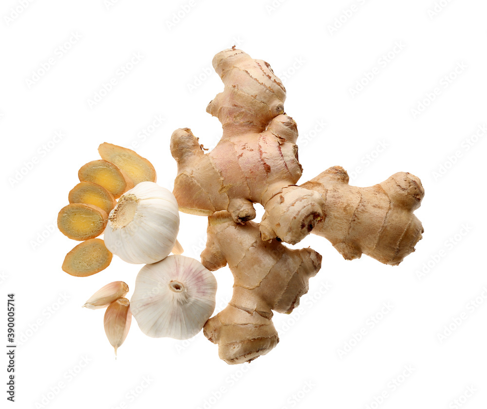 Fototapeta premium Ginger and fresh garlic on white background, top view. Natural cold remedies