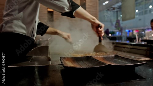 Fresh cooking Teppanyaki Japanese Food of Japanese chef cooking of meat with vegetable grill, In the traditional Japanese food of Hibachi teppanyaki style.