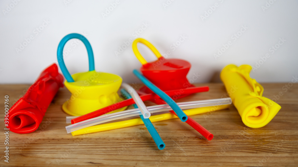 A variety of food-grade silicone, plastic-free alternatives for food bags, food storage, straws and cup lids showing more sustainable options A variety of food-grade silicone, plastic-free alternatives for food bags, food storage, straws and cup lids showing more sustainable options