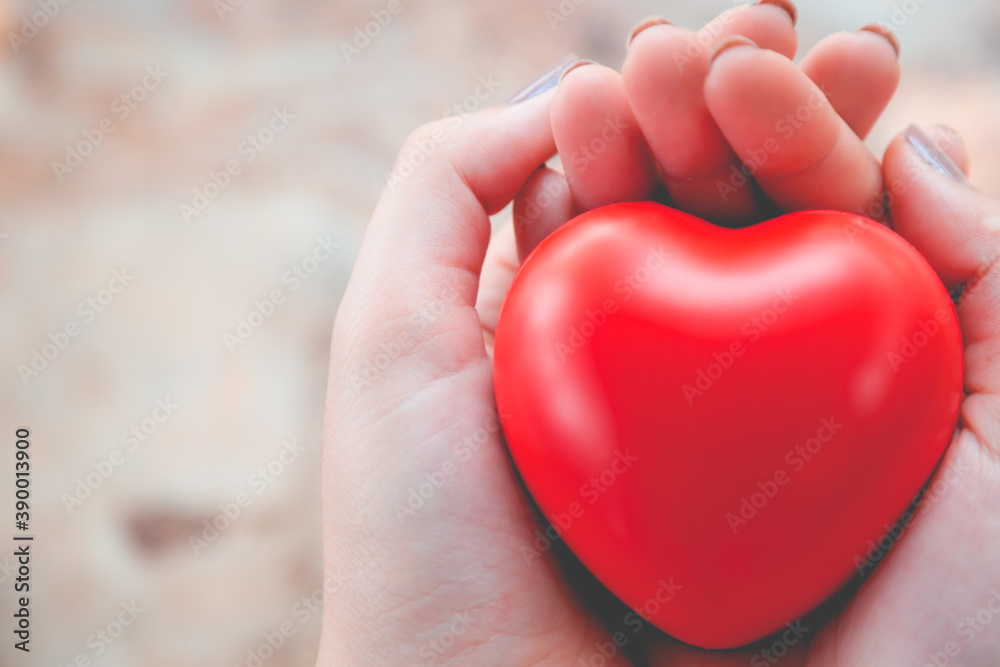 
Woman hold red heart use for background