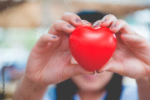  Woman hold red heart use for background