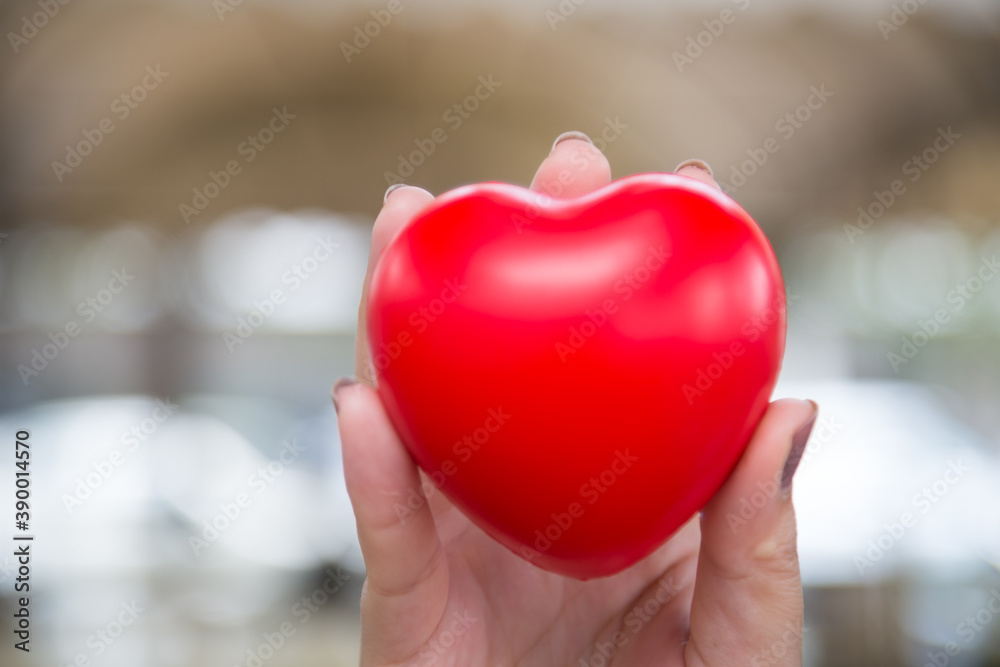 Woman hold red heart use for background
Woman hold red heart use for background