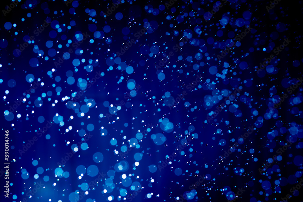 Abstract dark blue christmas glitter lights defocused bokeh