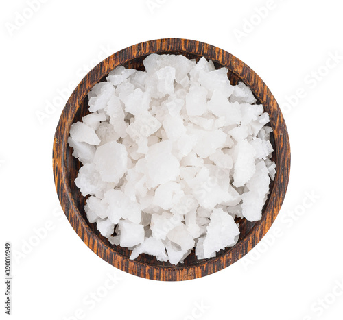 salt in a wooden bowl isolated on white background