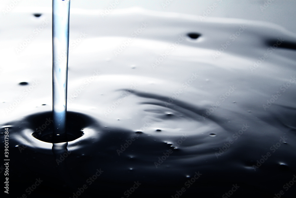 splash of water mixed with xanthan gum splash of water mixed with xanthan gum