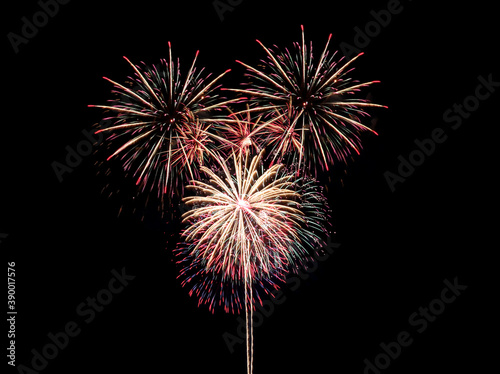 Colorful fireworks on black background.