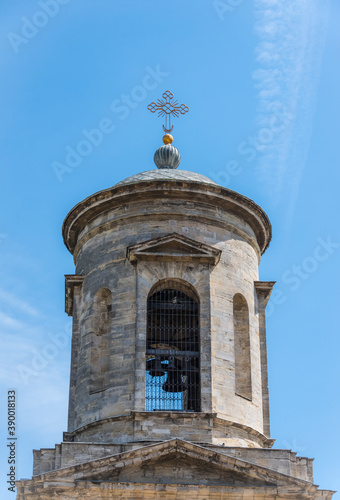 Bell tower with a cross of the ancient Byzantine Church of John the Baptist built in the 6th century in the city of Kerch on the Crimean Peninsula