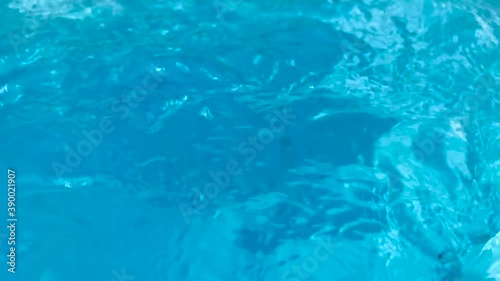 Closeup of crystal clear arctic blue water purification in slow motion photo