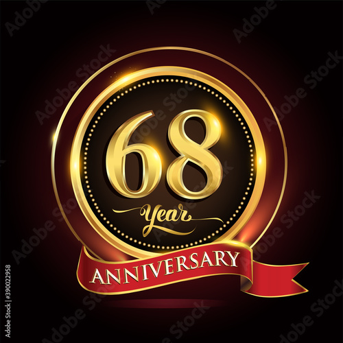 68th years celebration anniversary logo with golden ring and red ribbon. photo