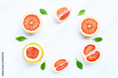 High vitamin C. Frame made of Juicy grapefruit on white