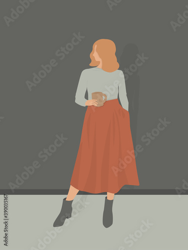 Young beautiful girl with short blond wavy hair in a long red skirt holding a mug of coffee isolated