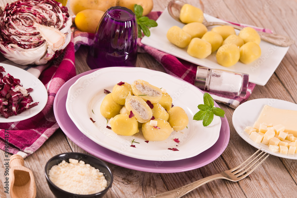 Potato gnocchi stuffed with radicchio and ricotta. Potato gnocchi stuffed with radicchio and ricotta.