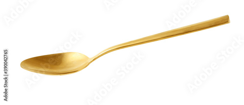 golden spoon on white background photo