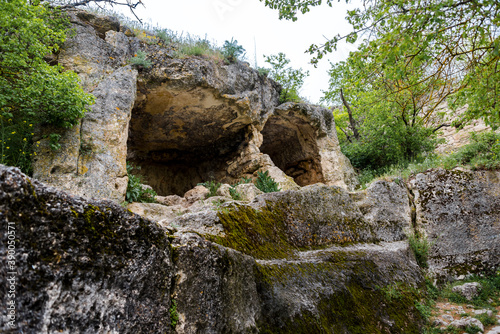 Houses built in caves in the famous ancient city-fortress Chufut-Kale ("Jewish Fortress" in Turkish) built in 5th - 6th century in the Crimean Mountains, now lies in ruins