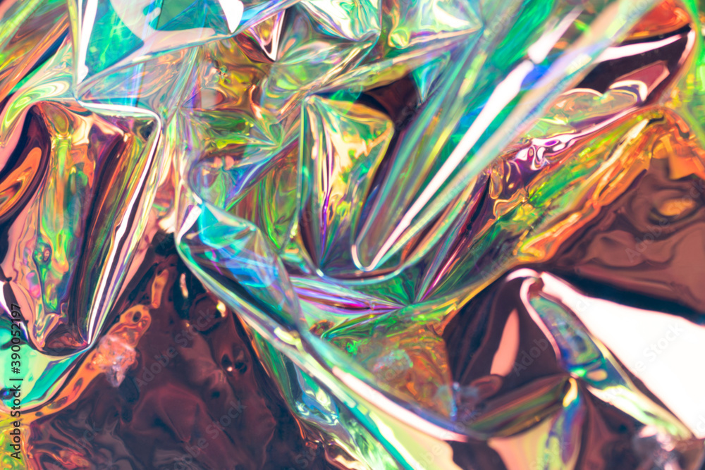 Fototapeta premium Colorful blurred holographic background. Wrinkled iridescent foil texture. Soft focus pearlescent surreal waves.