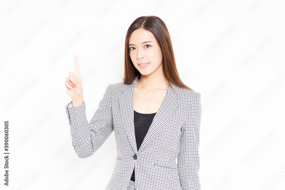 人差し指でポイントを示すビジネスウーマン 人差し指でポイントを示すビジネスウーマン