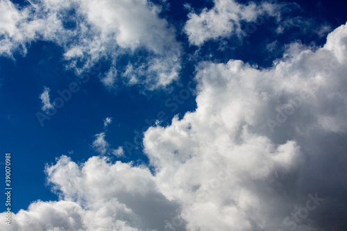 White clouds cumulus floating on blue sky for backgrounds concept