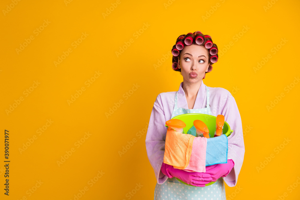 Girl hug bucket bottle spray look copyspace think lips pouted wear bath robe gloves isolated shine color background Girl hug bucket bottle spray look copyspace think lips pouted wear bath robe gloves isolated shine color background