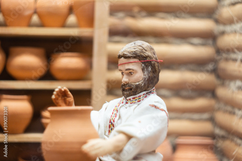 miniature figurines of people engaged in crafts
