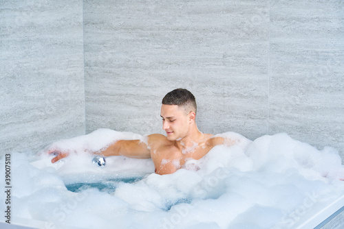 portrait of guy in bubble bath