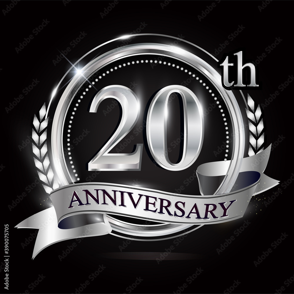 Celebrating 20th anniversary logo, with silver ring and ribbon.