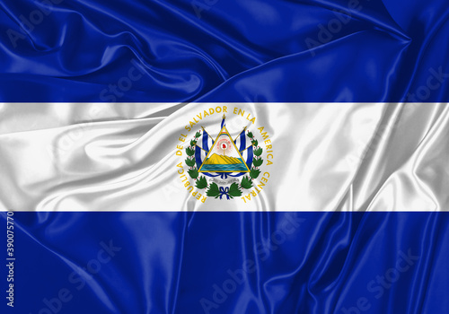 El Salvador flag waving in the wind. National flag on satin cloth surface texture. Background for international concept.