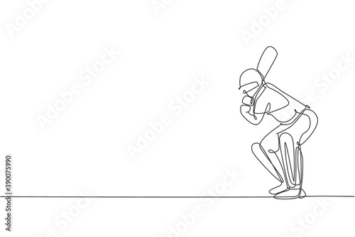 One continuous line drawing of young man cricket player stance standing to receive the ball from pitcher vector illustration. Sport concept. Dynamic single line draw design for advertisement poster photo