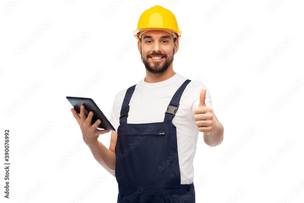 profession, construction and building - happy smiling male worker or builder in yellow helmet and overall with tablet pc computer showing thumbs up over white background profession, construction and building - happy smiling male worker or builder in yellow helmet and overall with tablet pc computer showing thumbs up over white background